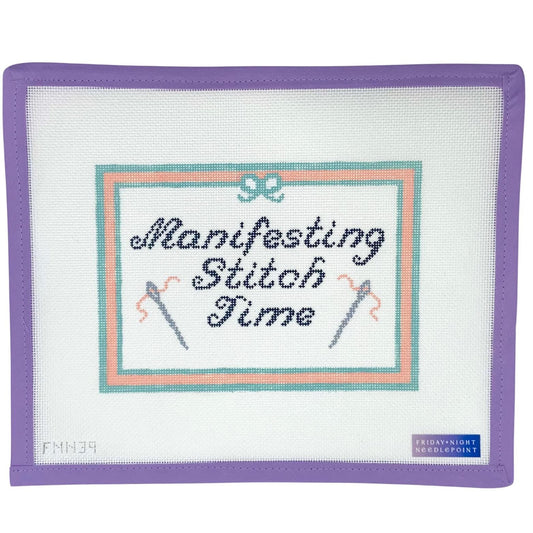 Embroidered patch needlepoint canvas with 'Manifesting Stitch Time' text and needle designs on a white background.