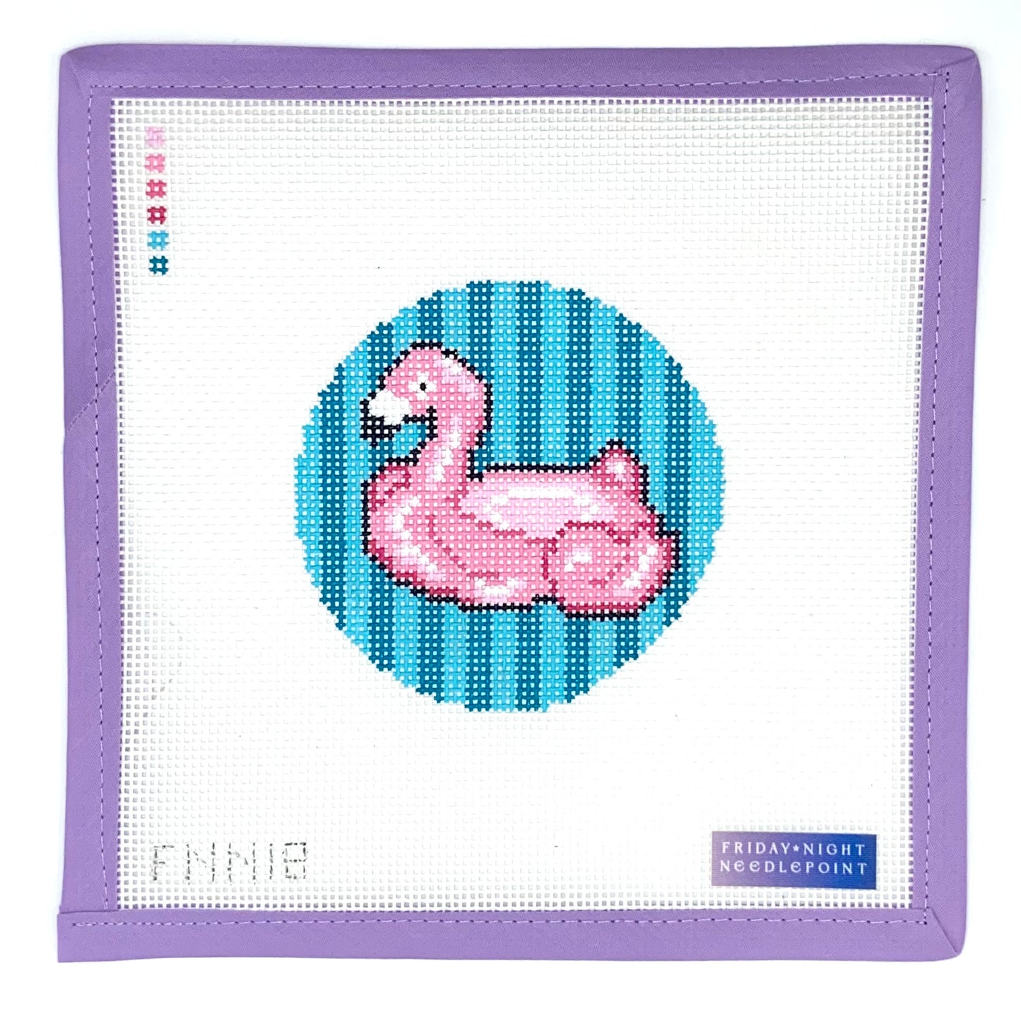 needlepoint flamingo design on a white fabric with purple border, featuring 'Friday Night Needlepoint' branding.