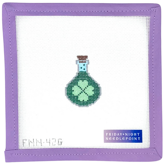 Needlepoint design of a lucky luck potion bottle on a white canvas  purple border, featuring 'Friday Night Needlepoint' branding.